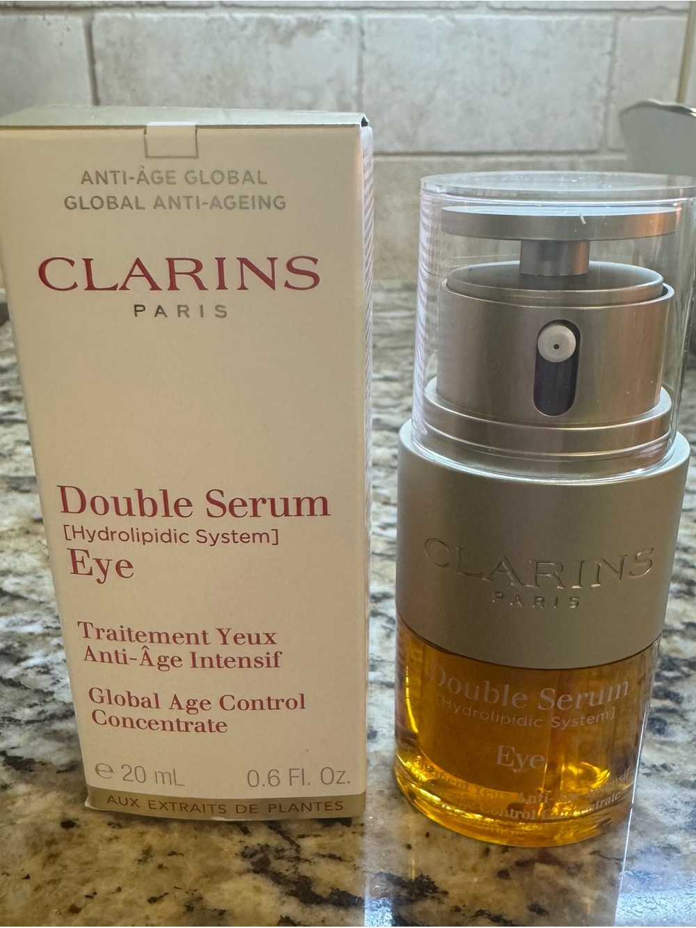 Clarins Double Serum Eye - Gold and Silver Pump Bottle